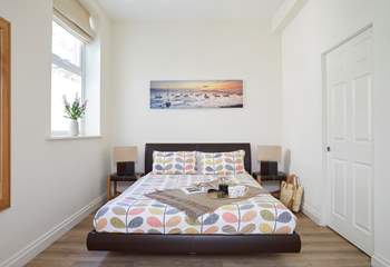 The beautiful main bedroom with the luxury of an en suite and dressing-room.