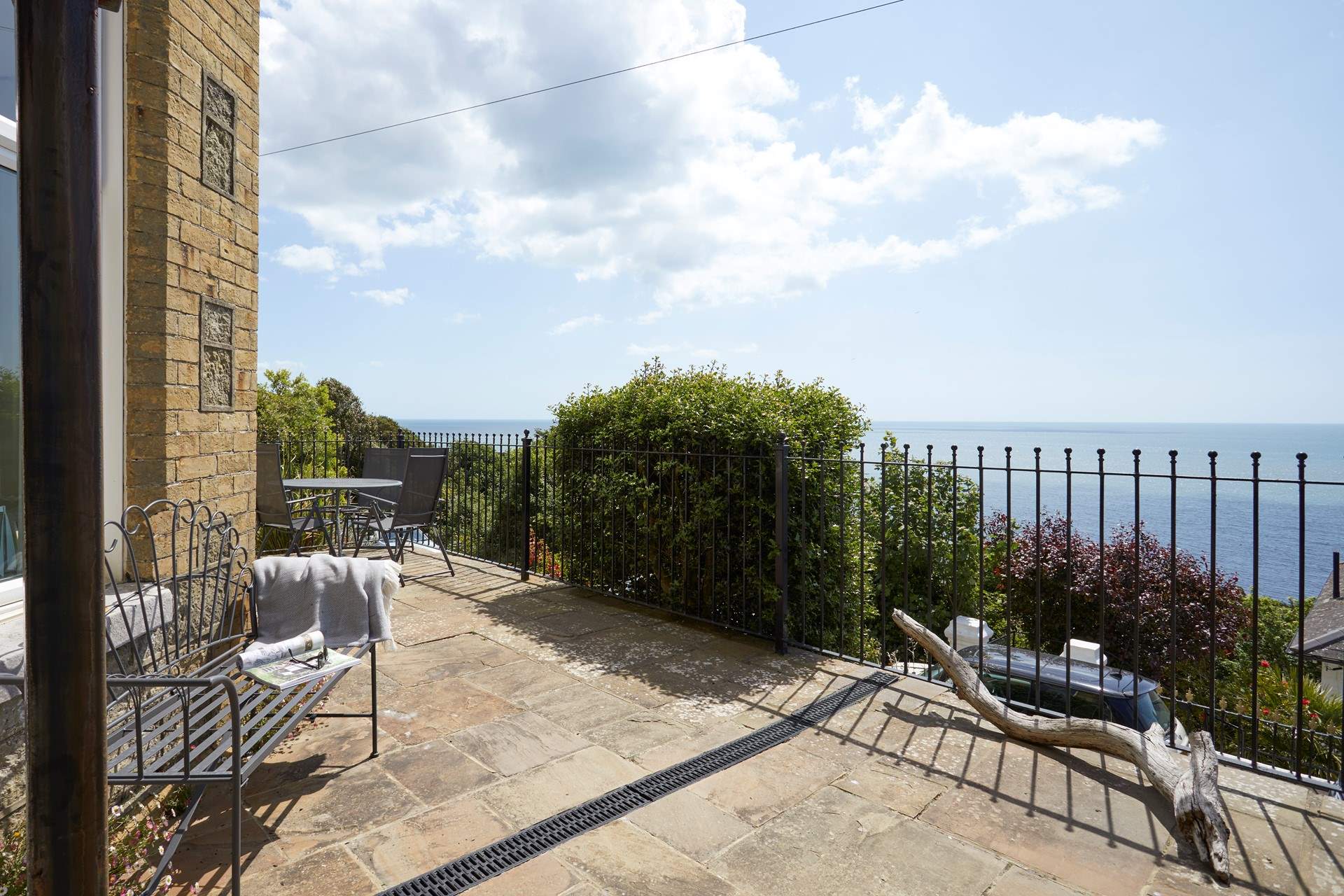 The terrace is to the front of the apartment.