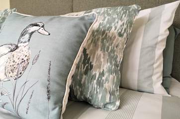 Light and calming colours are set throughout the apartment.