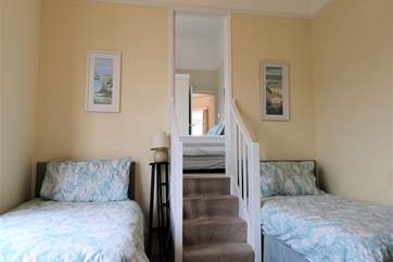 The double bedroom interconnects with bedroom two, another cosy bedroom with window seating.