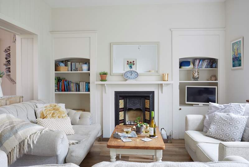 The comfortable sitting-room with gas fire.