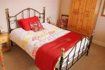 The comfortable double bed.