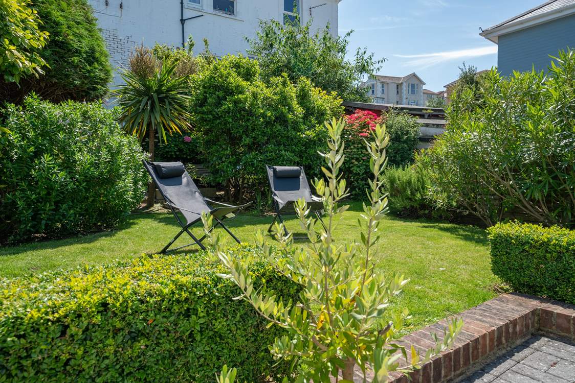 Spend a quiet afternoon relaxing under the islands sun in the comfort of the garden.