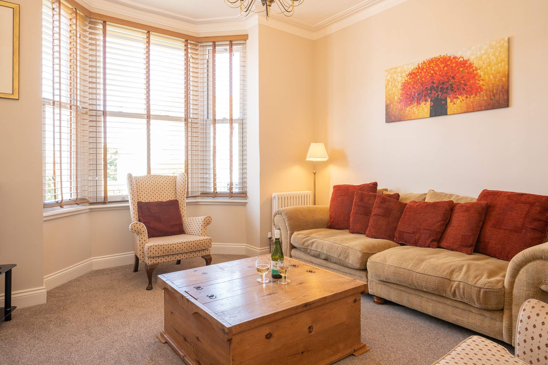 Relax on the comfy sofa in front of the TV.