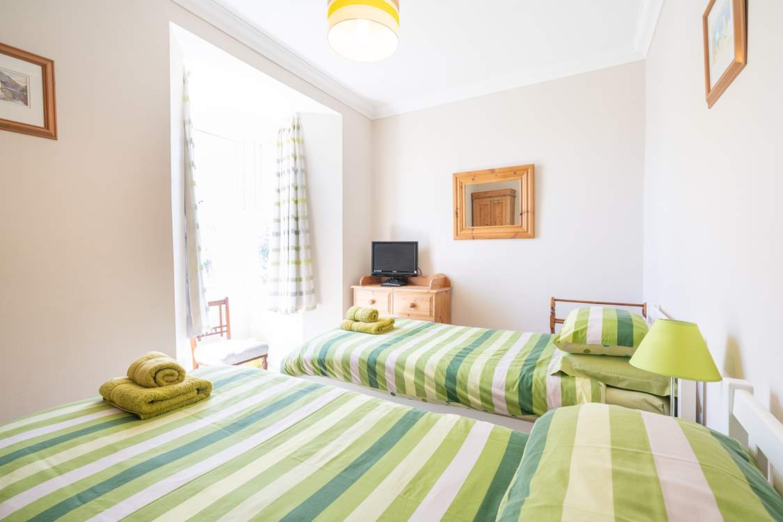 The light and airy twin bedroom on the first floor.