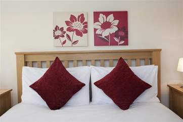 Tasteful colour scheme of the main bedroom.