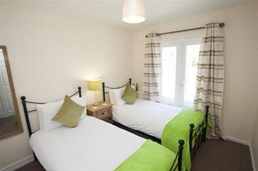 Pretty twin bedroom.