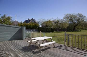 Direct access from your own rear deck onto the communal grounds.