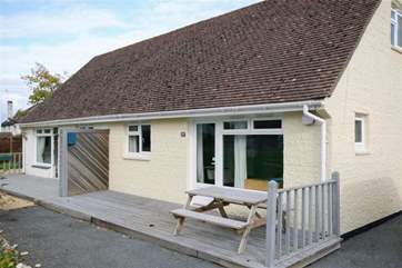 Rear decked area, ideal for sipping a beer or a glass of wine whilst the children run around.
