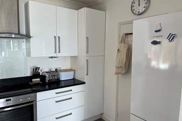 A colourful, quirky addition to the beautiful modern kitchen.