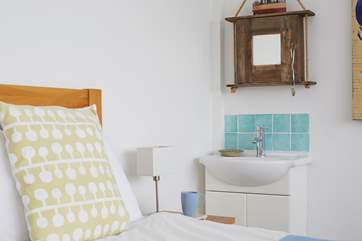 Bedroom 1 has a washbasin.
