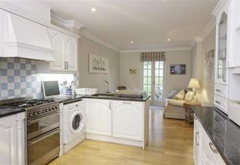 The kitchen/dining room is modern and fully equipped with everything you are likely to need.