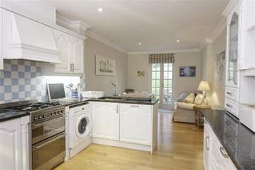 The kitchen/dining room is modern and fully equipped with everything you are likely to need.