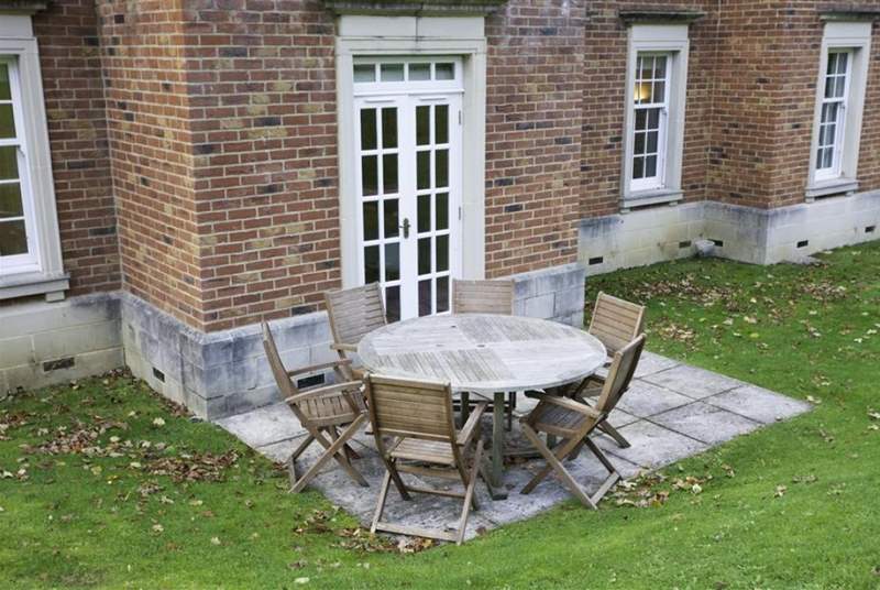 With access from the kitchen, enjoy dinner al fresco on the patio.