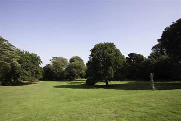 The lush, leafy grounds surrounding the property ensure it feels delightfully secluded.