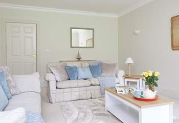 The sitting-room has been finished to offer a warm and comfy welcome.