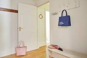 Stepping into the apartment and you are welcomed into an entrance hall.
