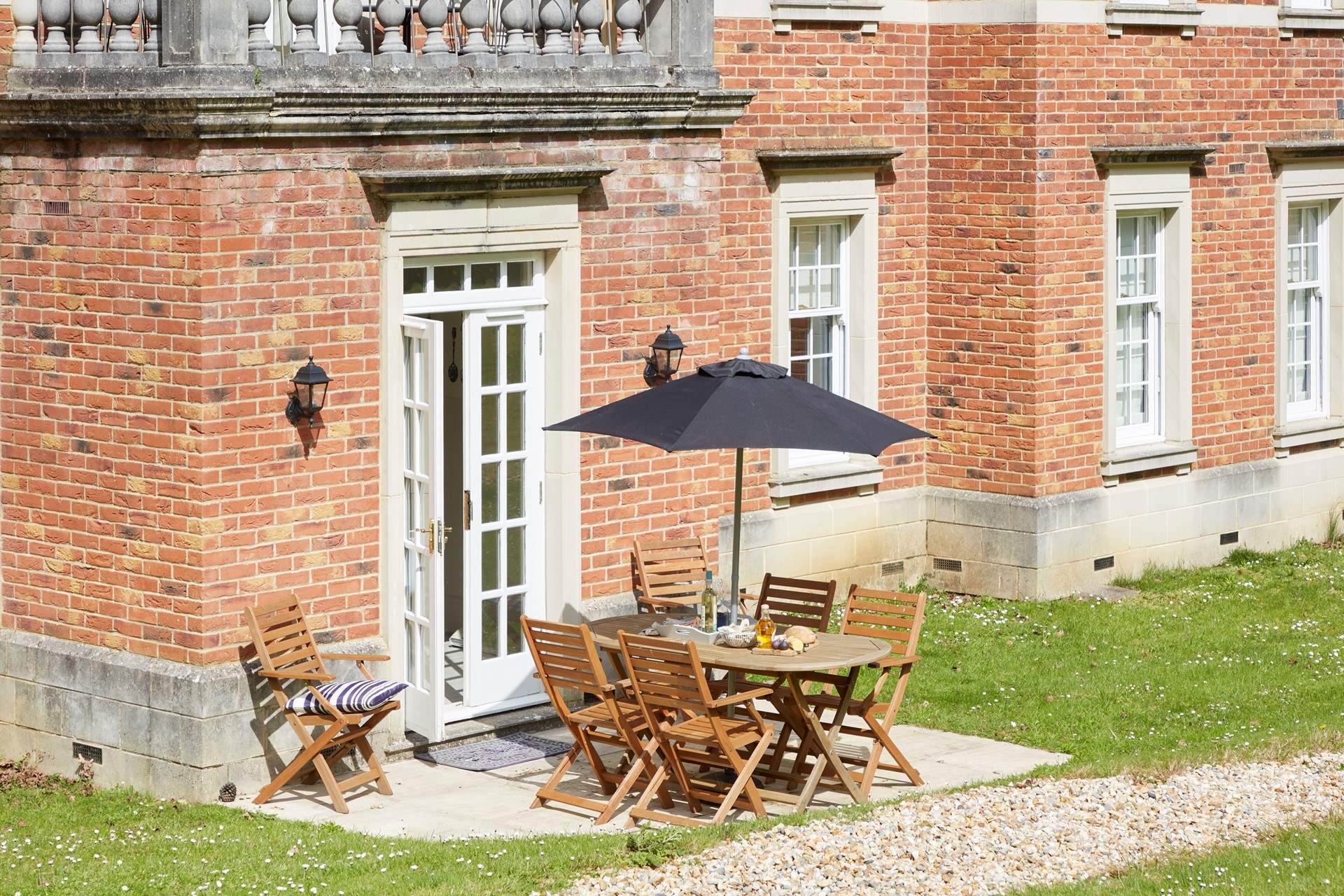 With access from the kitchen, enjoy dinner al fresco on the patio.