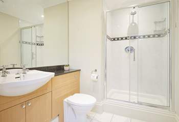 One of two contemporary bath/shower-rooms.