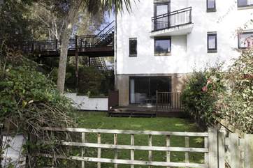Patio doors lead out to the enclosed rear garden.
