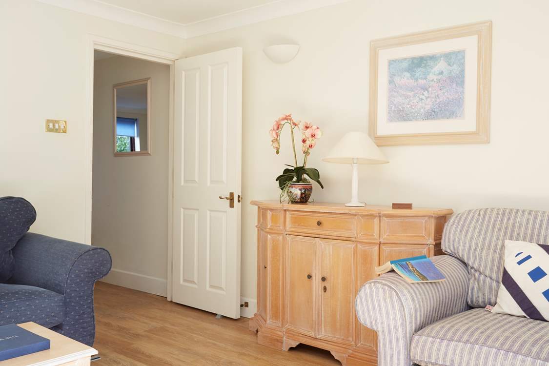 Enjoy an afternoon read in the comfortable sitting-room.