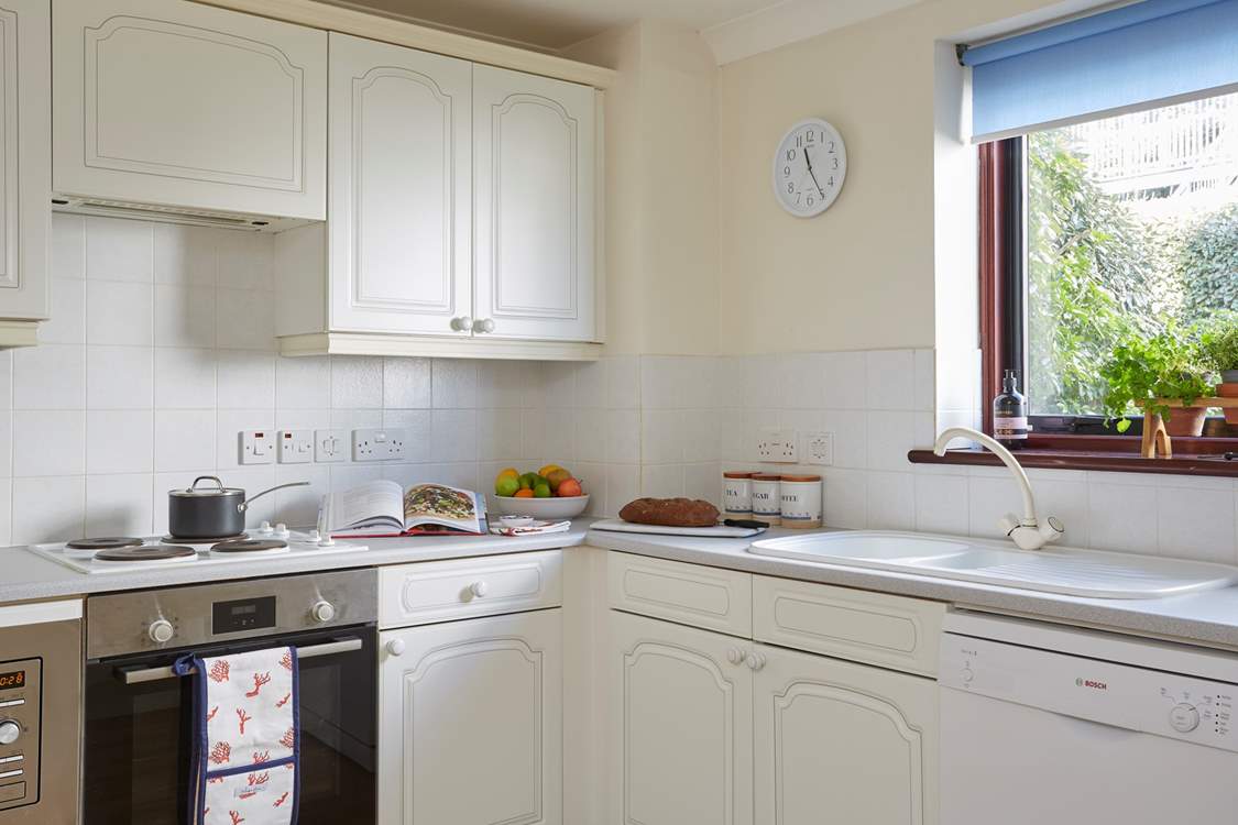 Prepping for lunch in the well-equipped kitchen.