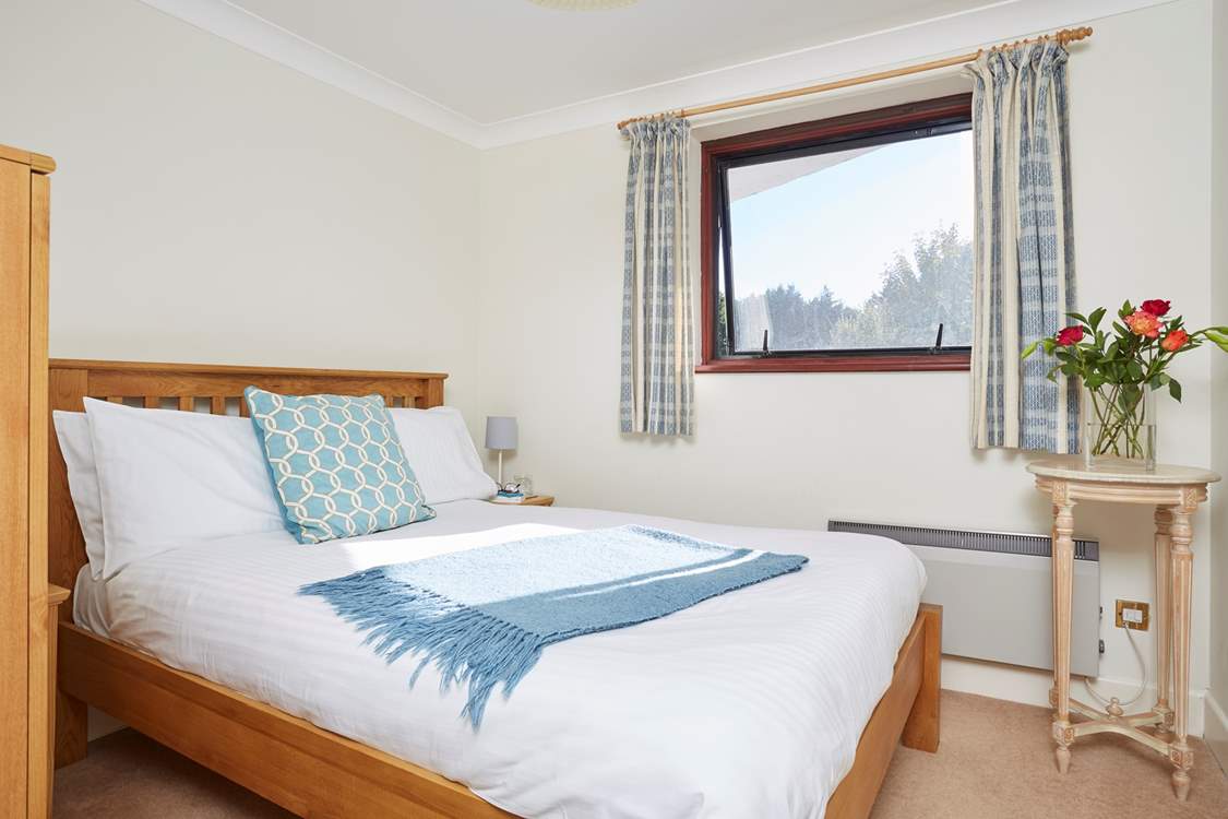 The second double bedroom is bright and comfortable.