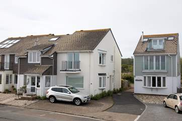 Located on the seafront with allocated parking for two cars.