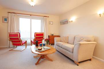 While the sitting-room is a pleasant place to watch television, you will not be able to take your eyes off the view.