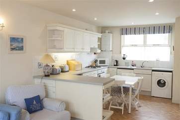 The dining-area is in the open plan kitchen.