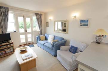 Living-room with plenty of soft seating.