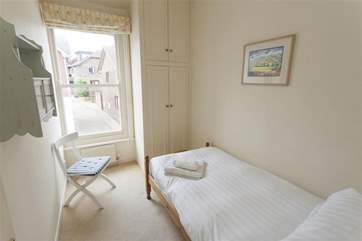The single bedroom faces out onto Pier Road and is on the first floor.