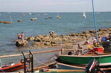 Enjoy watching the children crabbing on the esplanade.