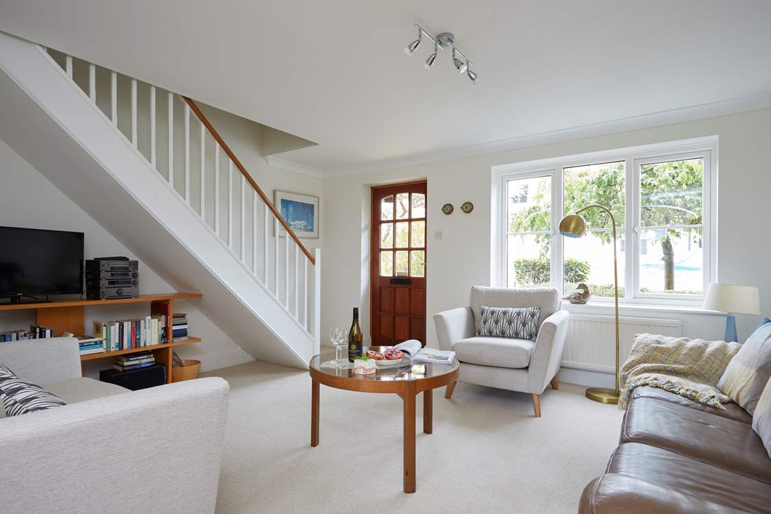 The beautifully decorated sitting-room is spacious and light. The ground floor is open plan with kitchen and dining areas.