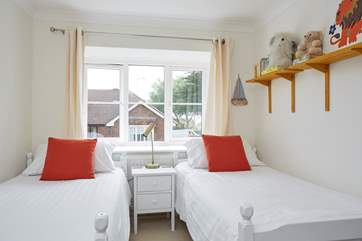 Bedroom 2 has twin beds, ideal for either children or adults.