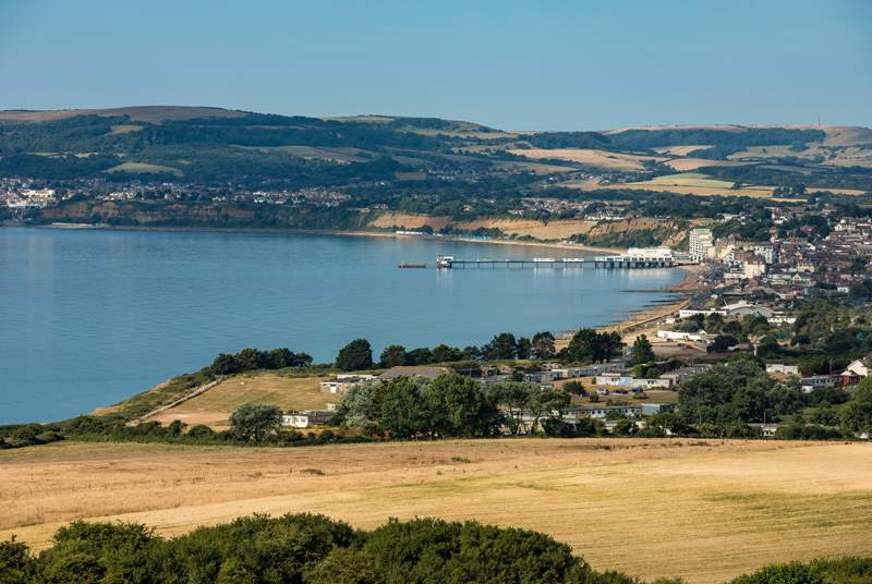 The captivating countryside and seascapes of the Isle of Wight. This is the view towards Sandown from the downs.