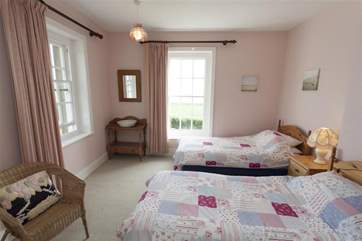 Twin bedroom on first floor with sea views.