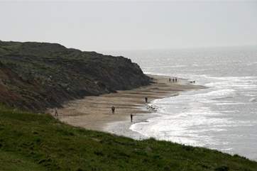 Compton Bay has something for all ages, you can hunt for fossils from the dinosaur era, or catch a wave on a surfboard.
