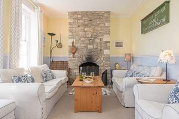 Large sitting/dining-room with windows offering superb views.