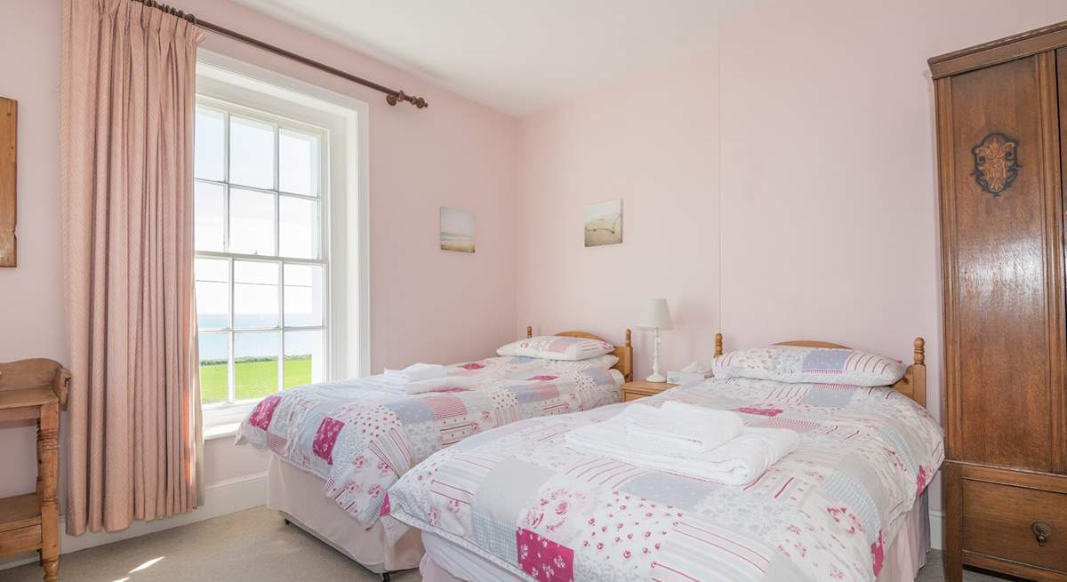 The twin bedroom on first floor with sea views.