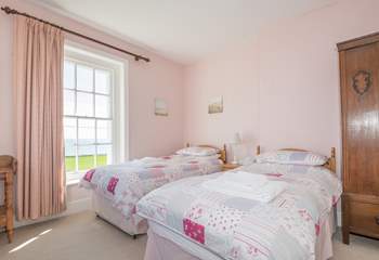 The twin bedroom on first floor with sea views.