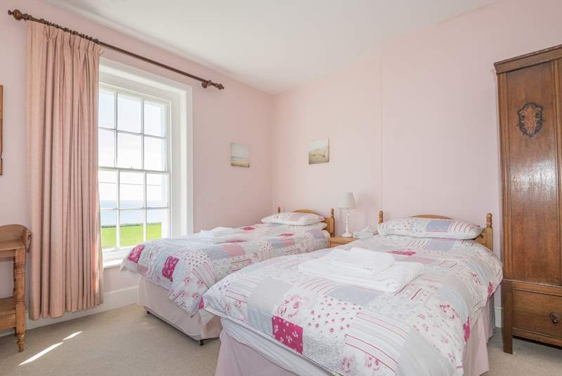 The twin bedroom on first floor with sea views.