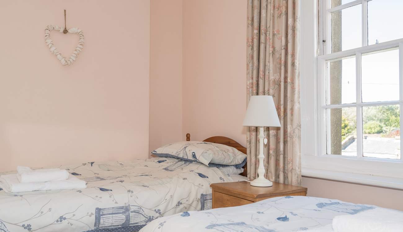 The smaller twin bedroom on the first floor.