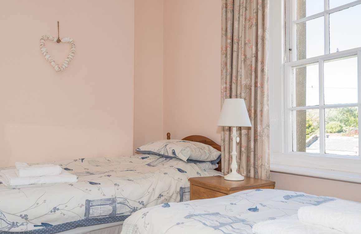 The smaller twin bedroom on the first floor.