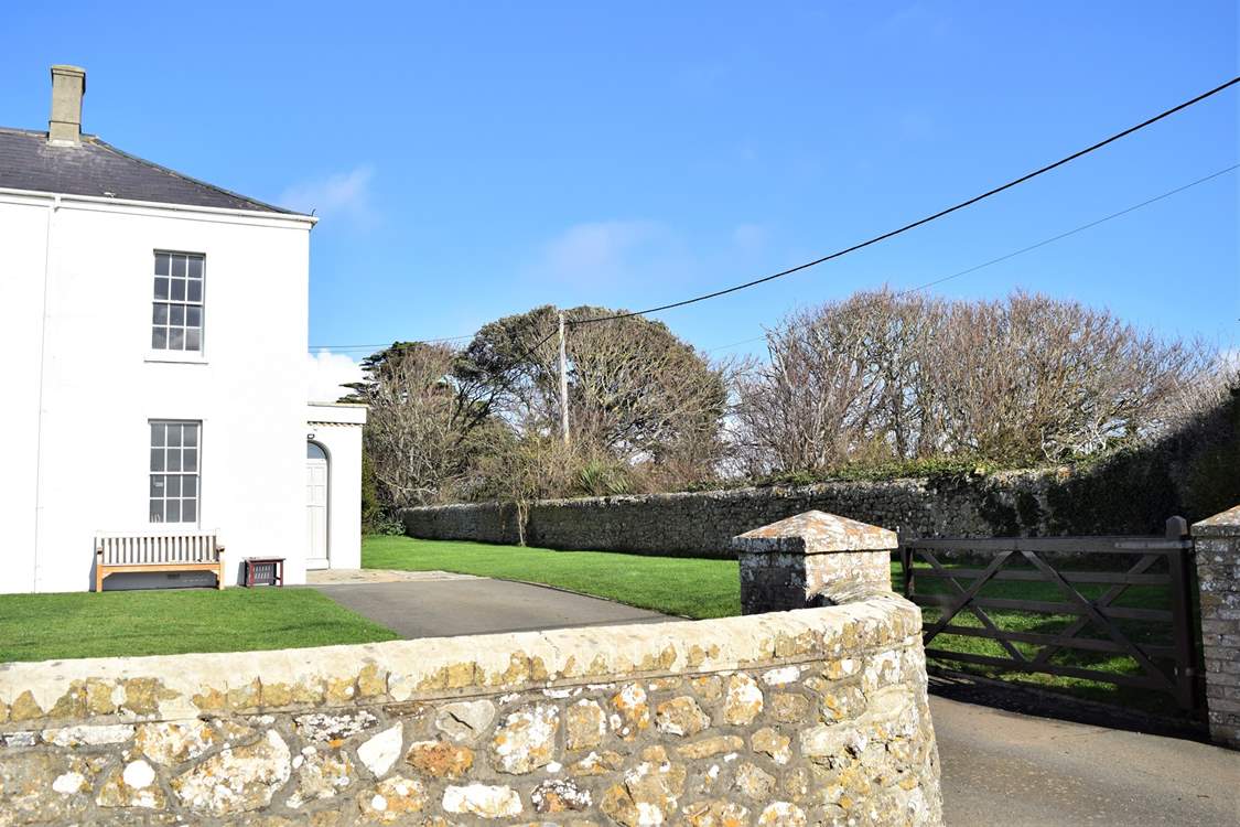 The entrance is just off a little lane at the front of the property; plenty of parking space.