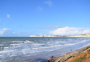 Compton Bay has something for all ages, you can hunt for fossils from the dinosaur era, or catch a wave on a surfboard.