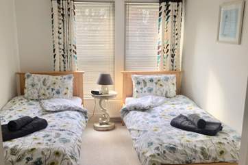 Twin bedroom with sea views.