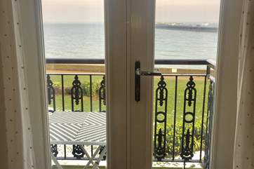 Enjoy the views from the small balcony just off the living area.
