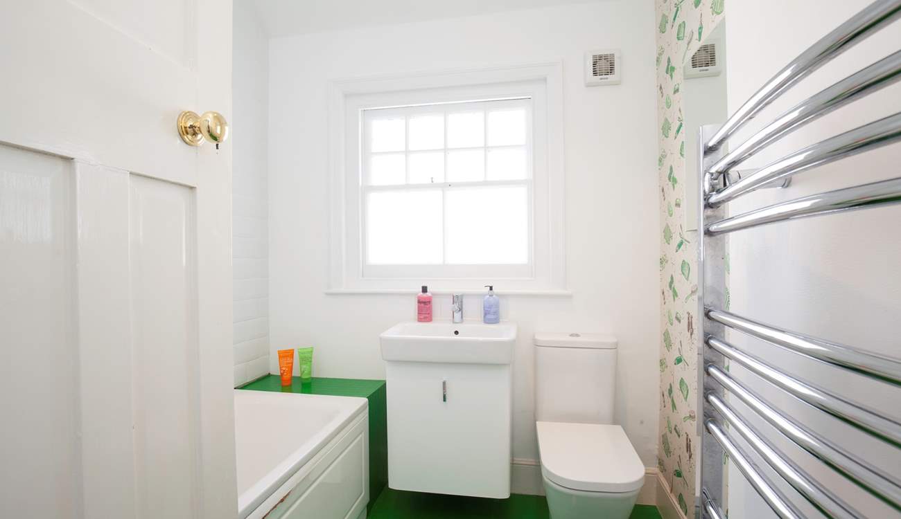 One of two modern bath/shower-rooms.