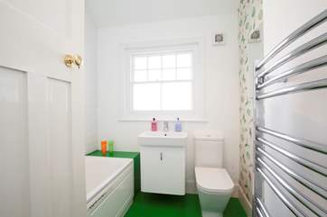 One of two modern bath/shower rooms.